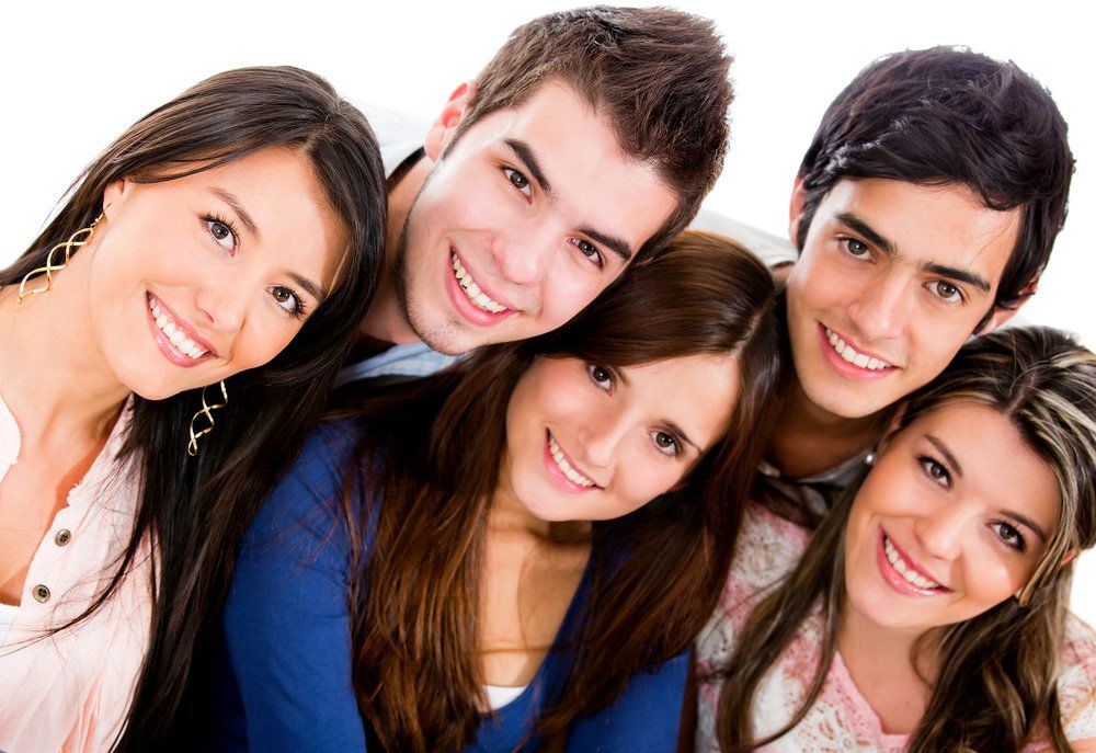 Two attractive smiling couples