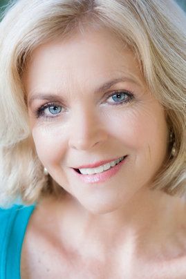 A middle-aged woman with a great smile