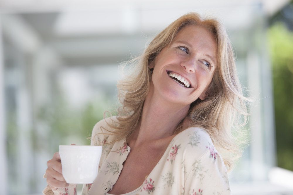 Woman with a cup of coffee