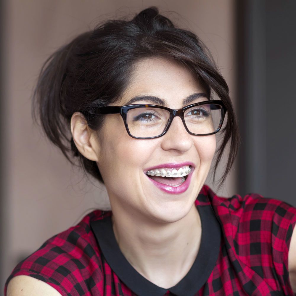 smiling woman with braces