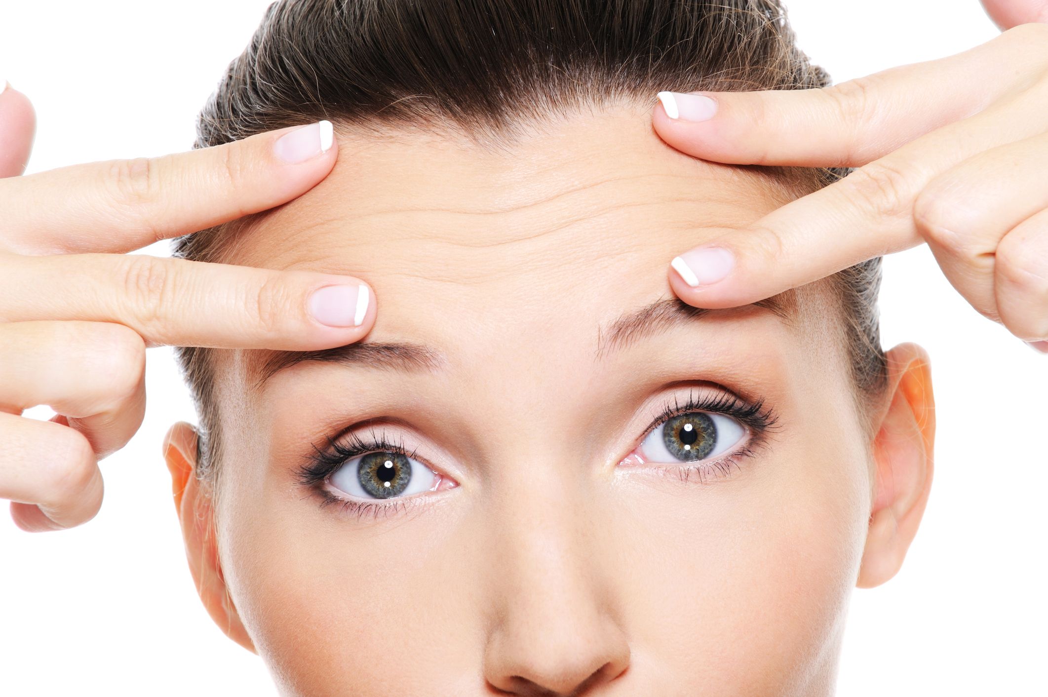 A woman with creases across her forehead