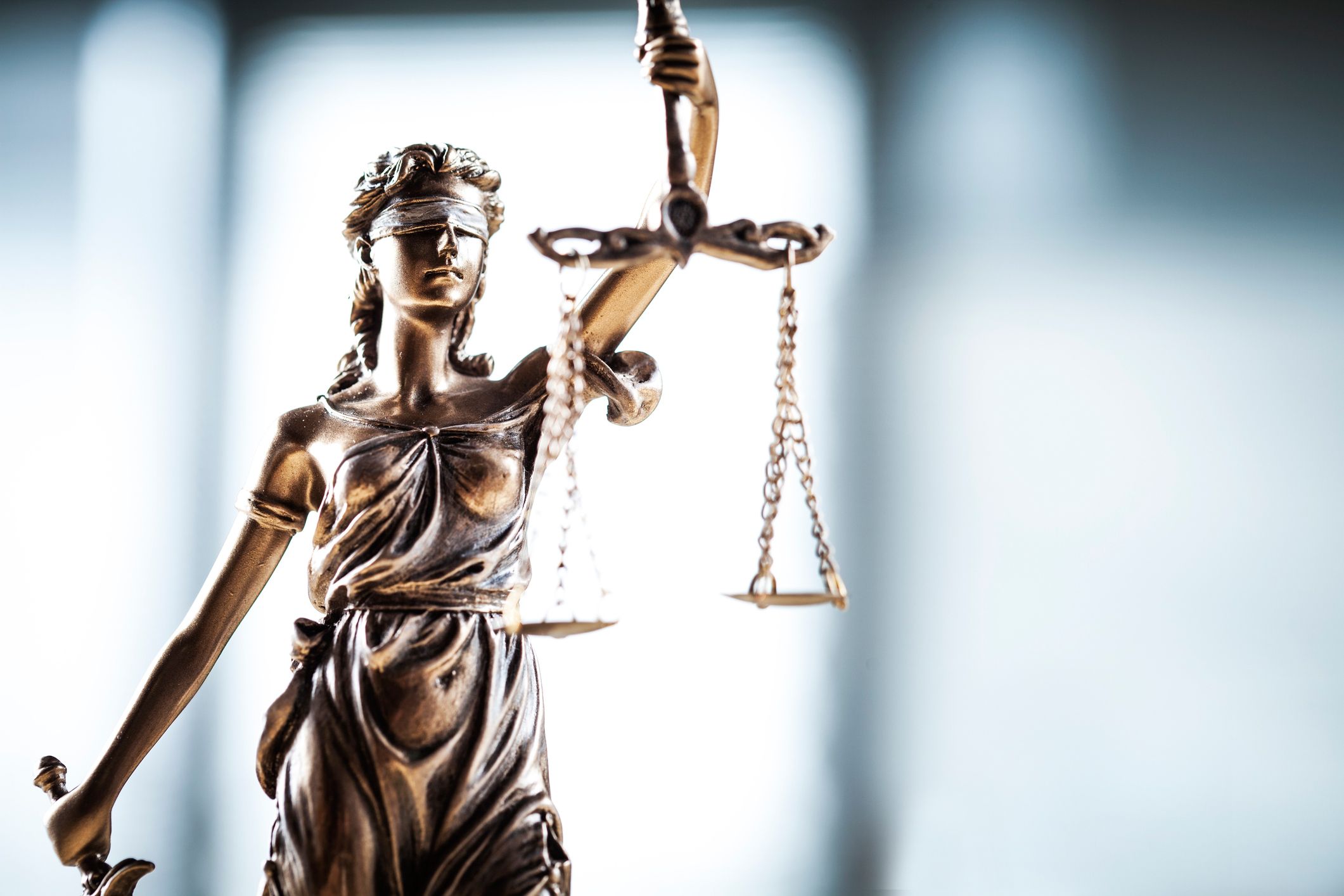 Lady justice with legal scales