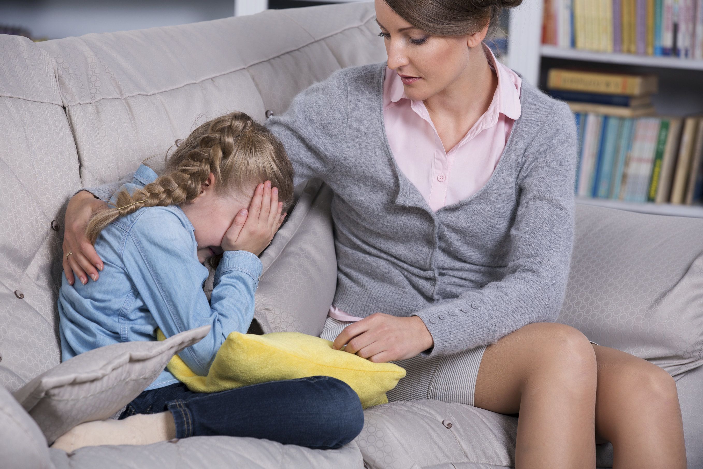 Mother comforting her child during a difficult time