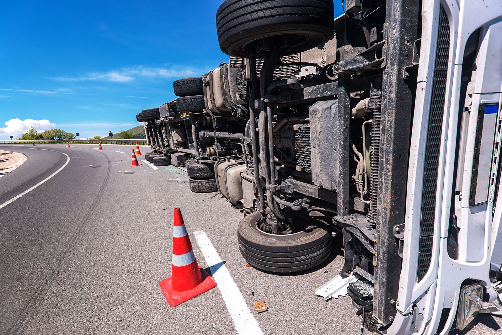 a rolled over log truck