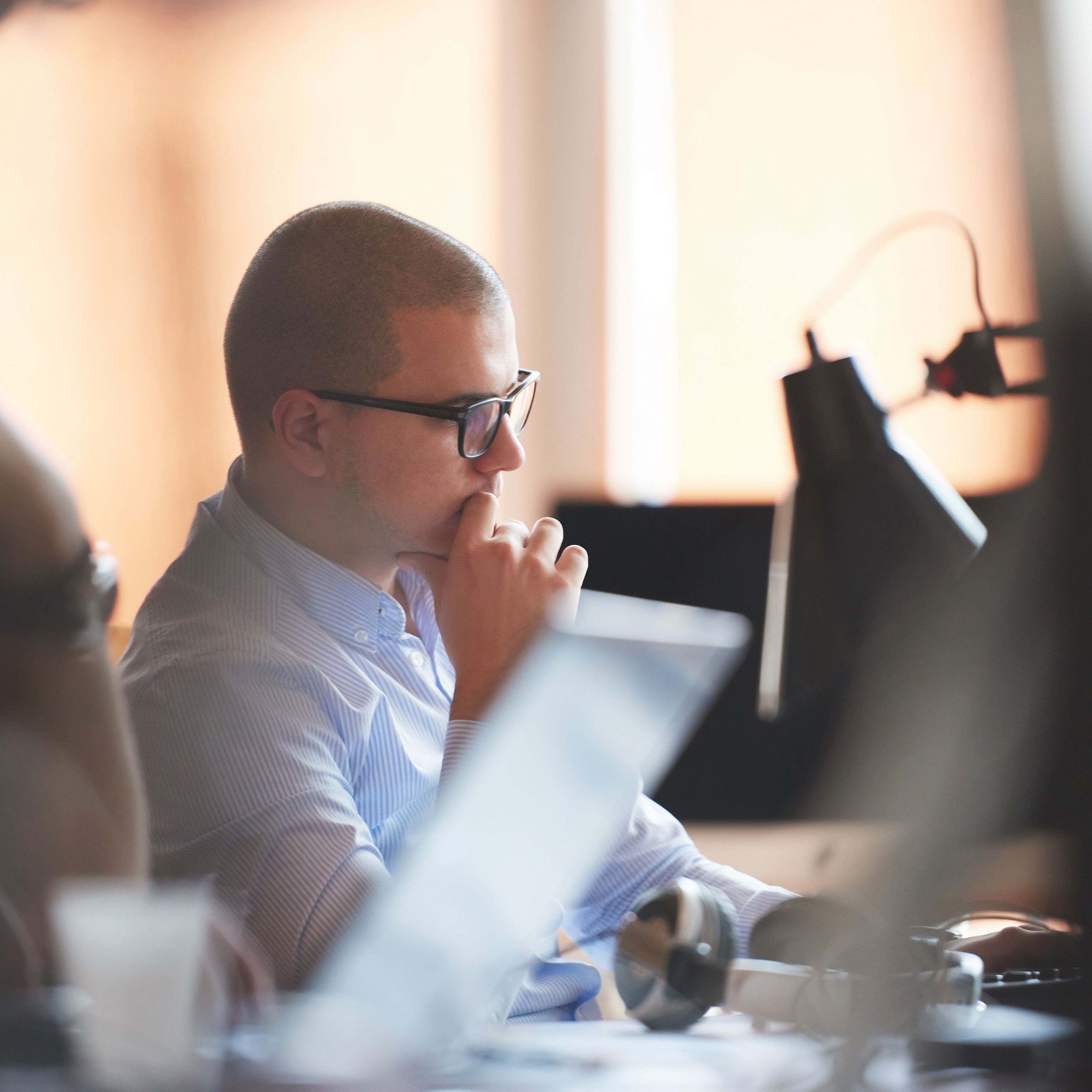 Young man sitting at desk