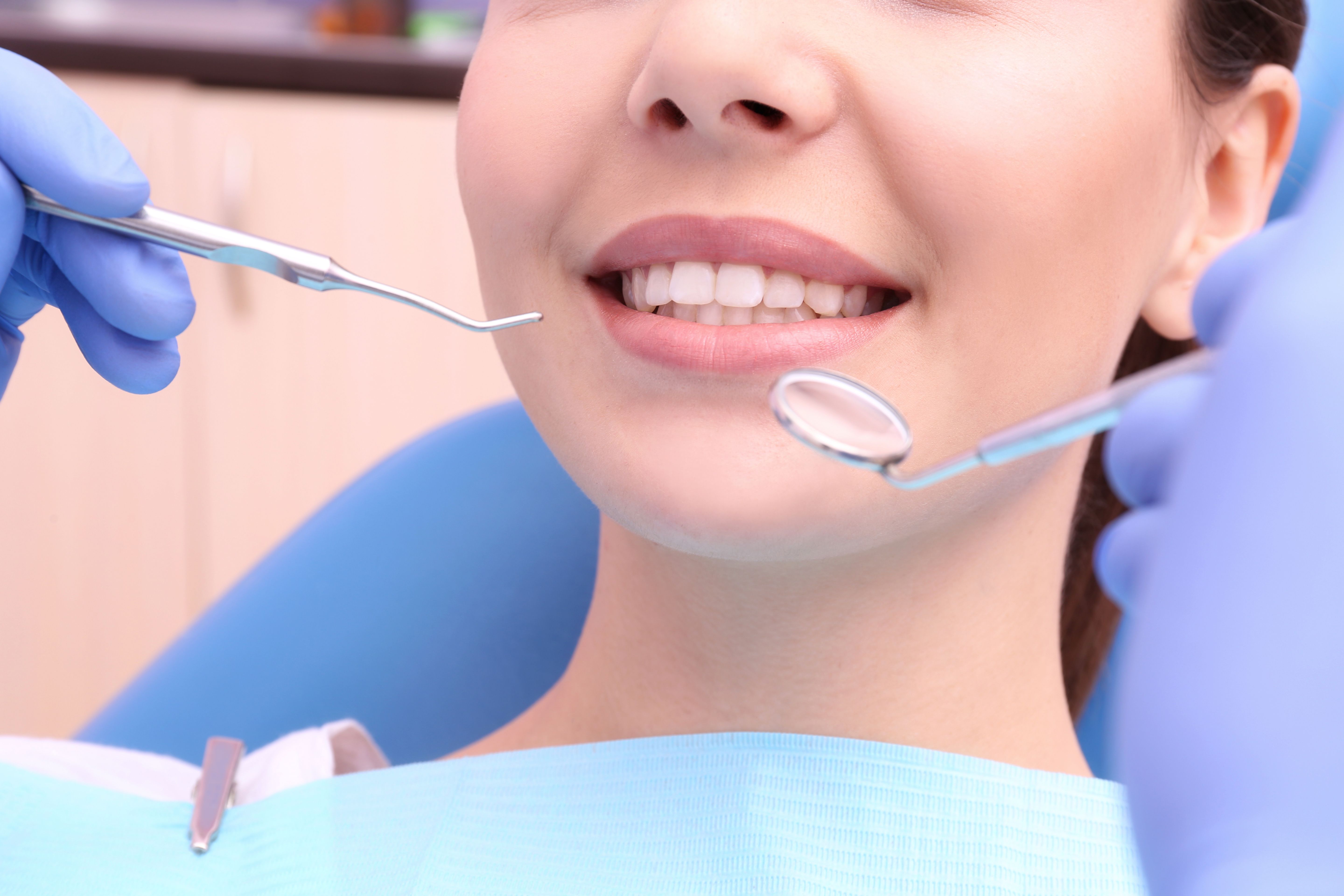 A woman undergoing a dental exam