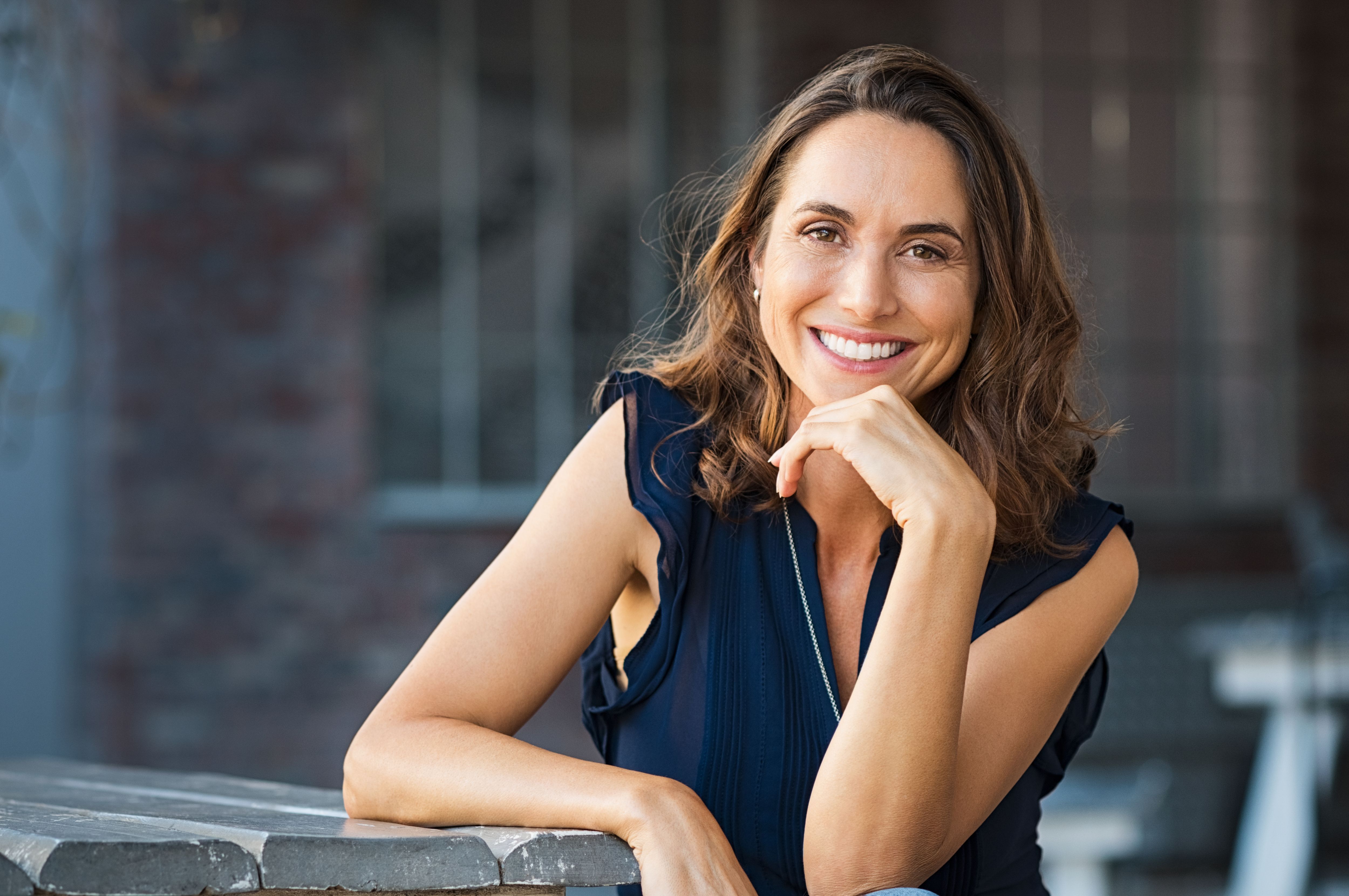 A woman smiling